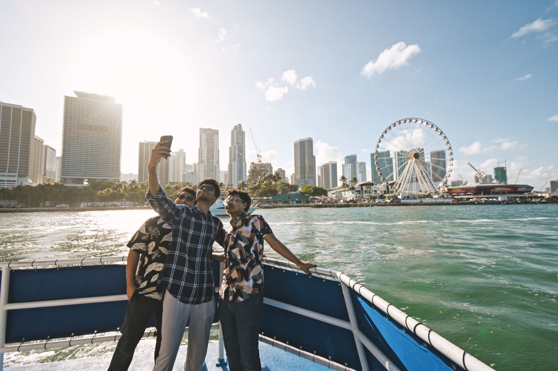 Selfie shot of passengers with the Miami skyline