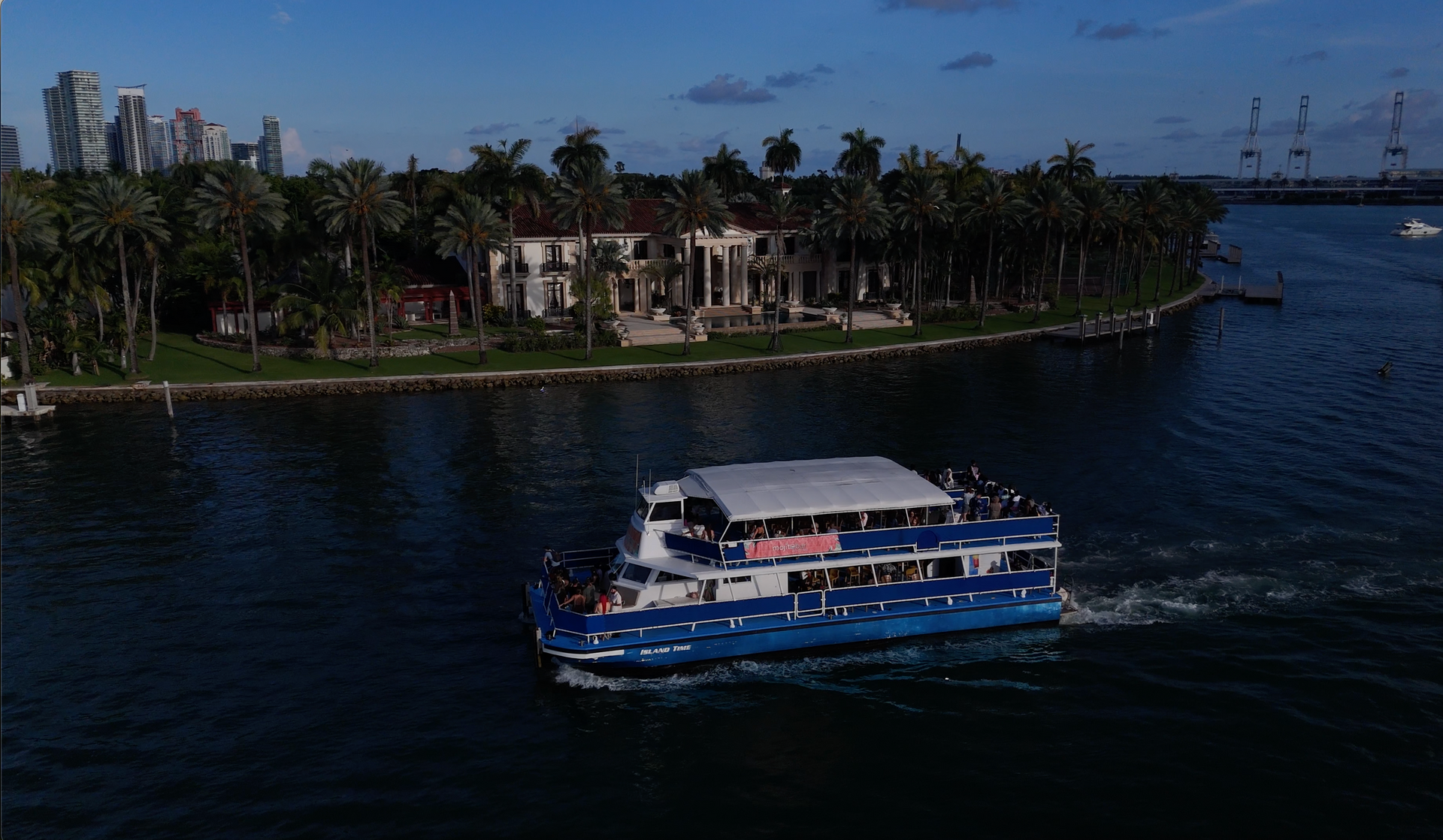 Miami Boat cruise passing by Miami Star island the Viagra Mansion