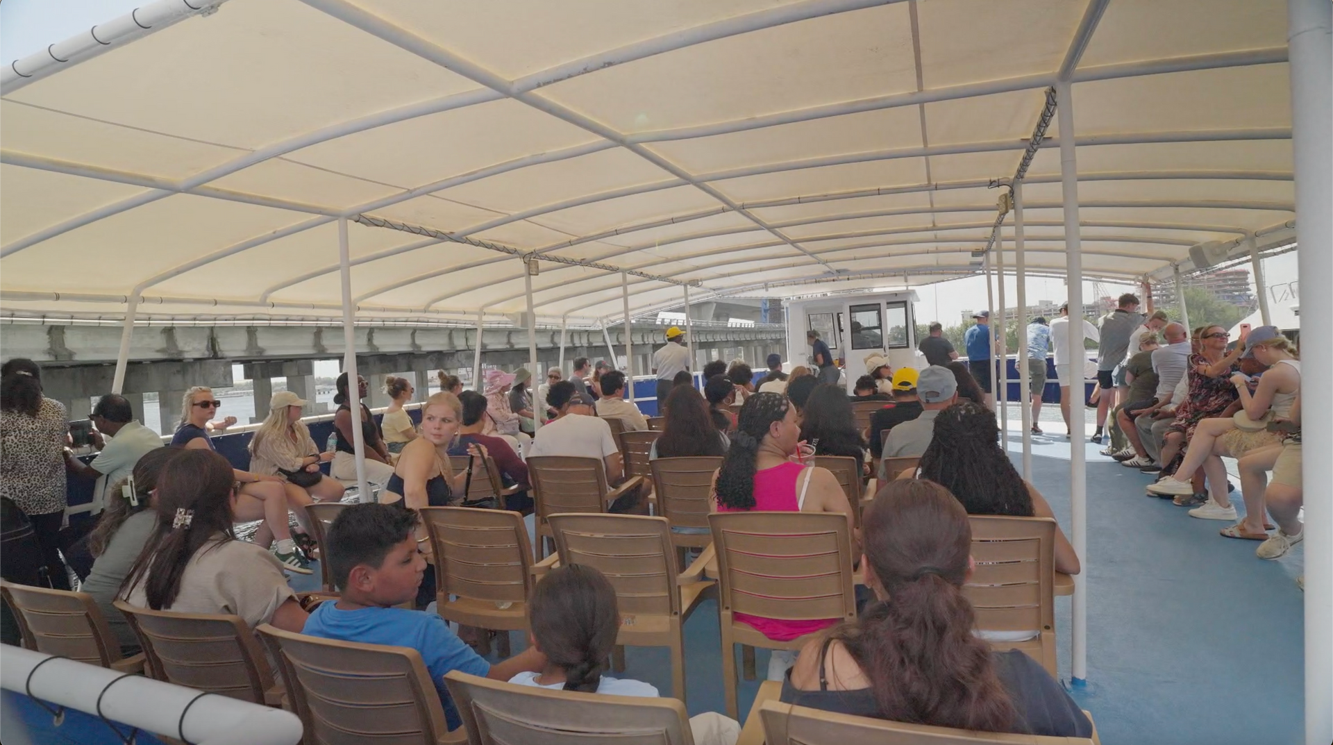 Guests enjoying a Miami sightseeing cruise near celebrity mansions