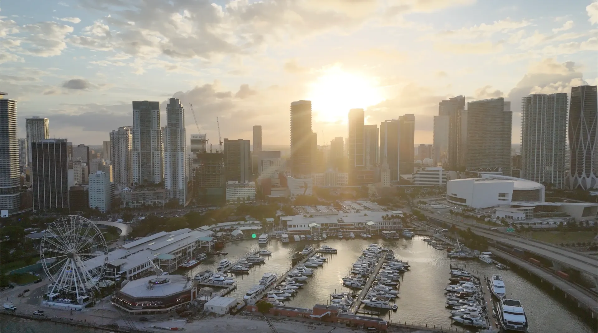 Aerial view of Bayside Marketplace and Downtown Miami during sunset near Miami Sunset Cruise departures