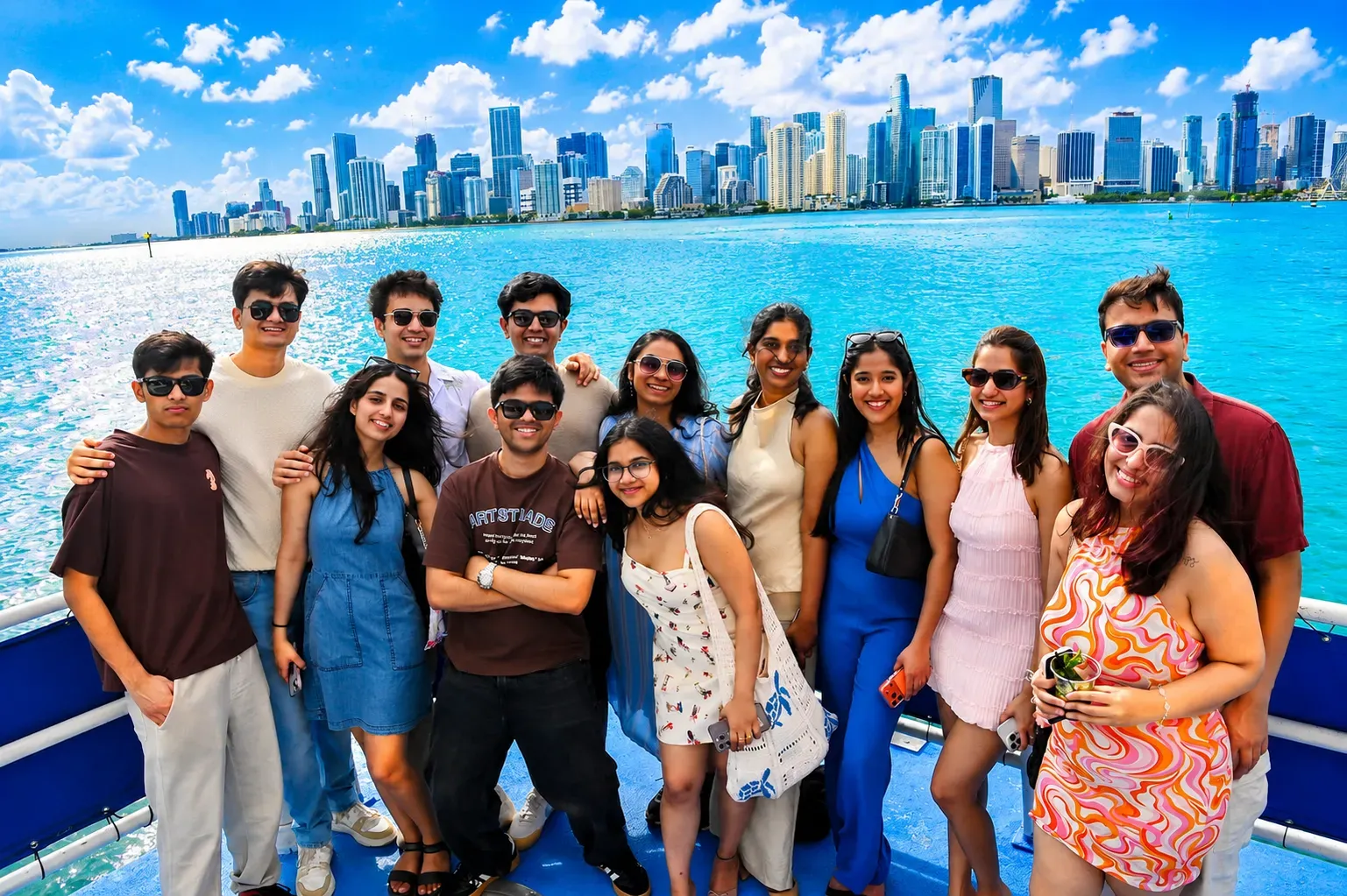Visitors enjoying a Biscayne Bay skyline boat tour with panoramic views of Downtown Miami, Brickell, and the waterfront skyline.