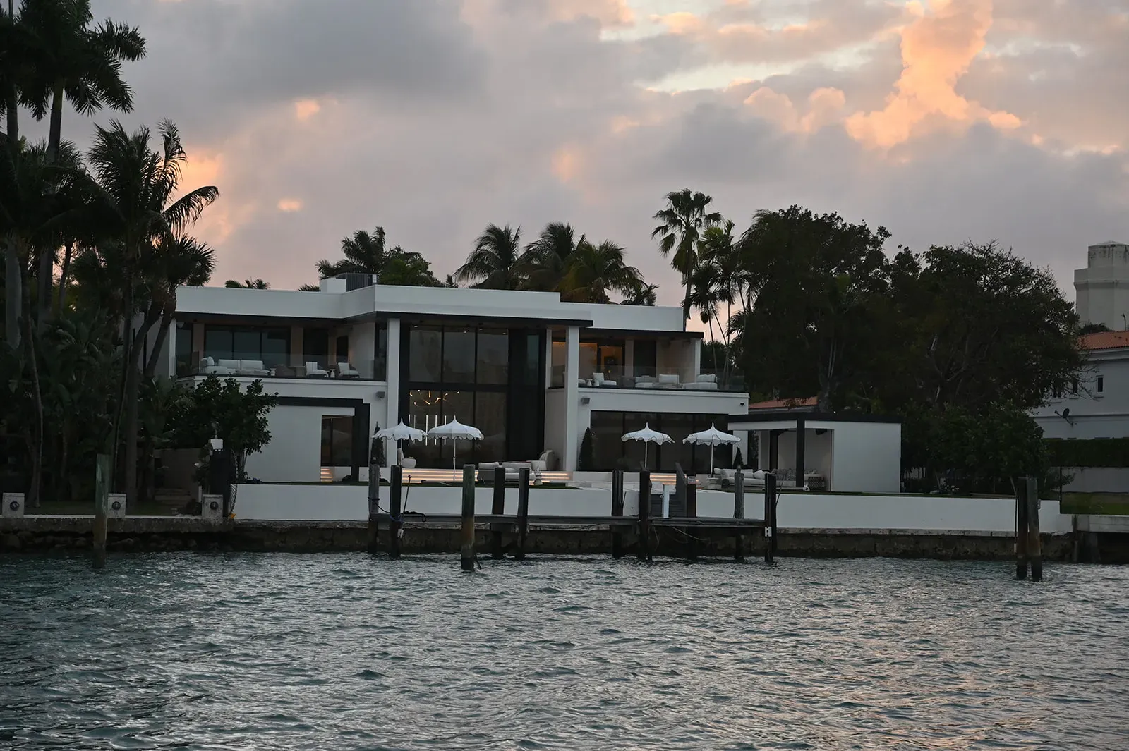 Celebrity mansion views during a Miami sunset sightseeing cruise on Biscayne Bay near Star Island