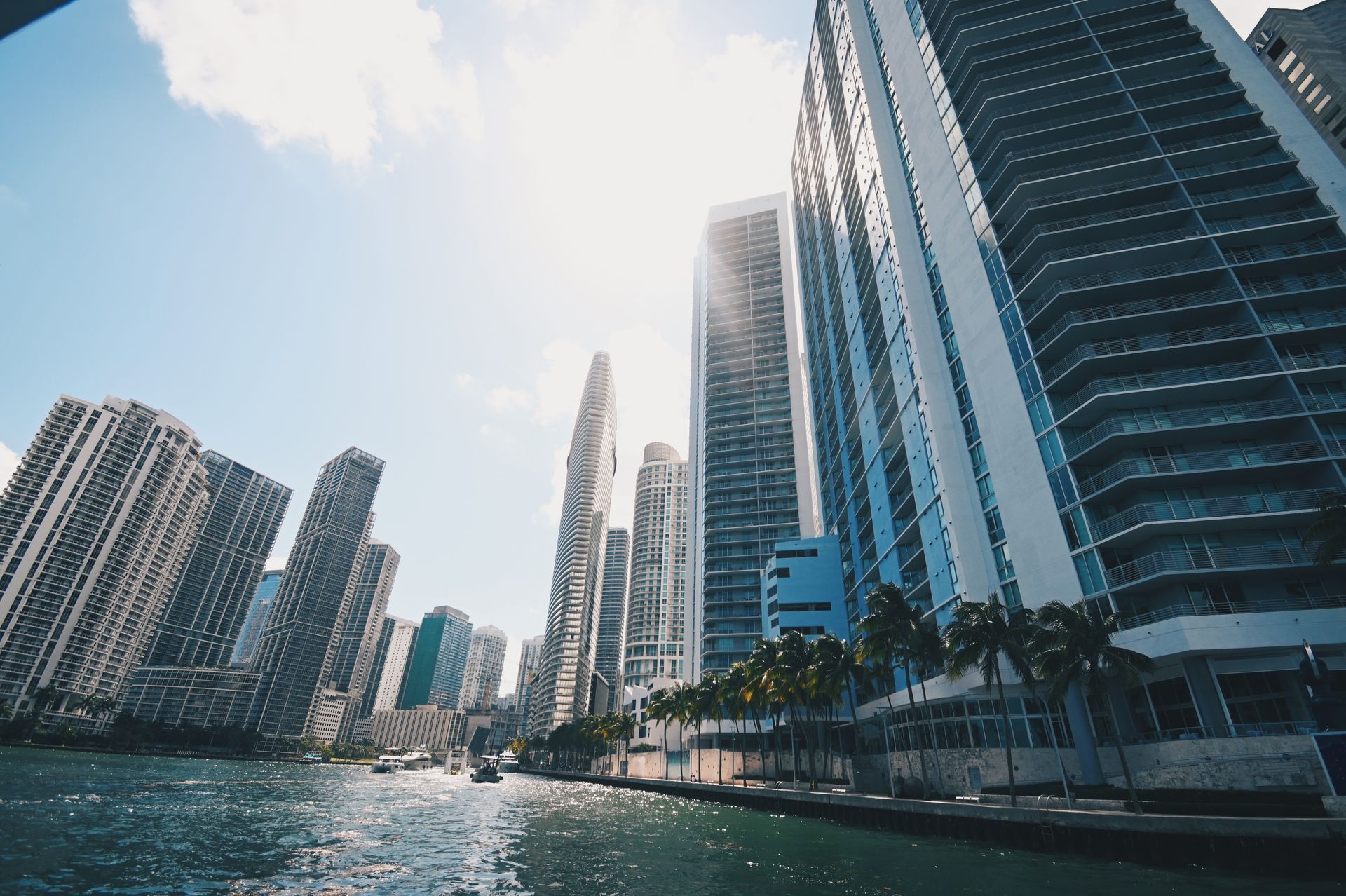 Miami River entrance viewed from the water with downtown Miami skyline and the Aston Martin Residences tower