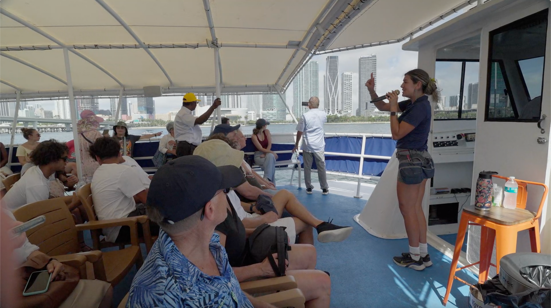 Tour Guide giving the Sightseeing Miami boat Cruise tour in English and Spanish