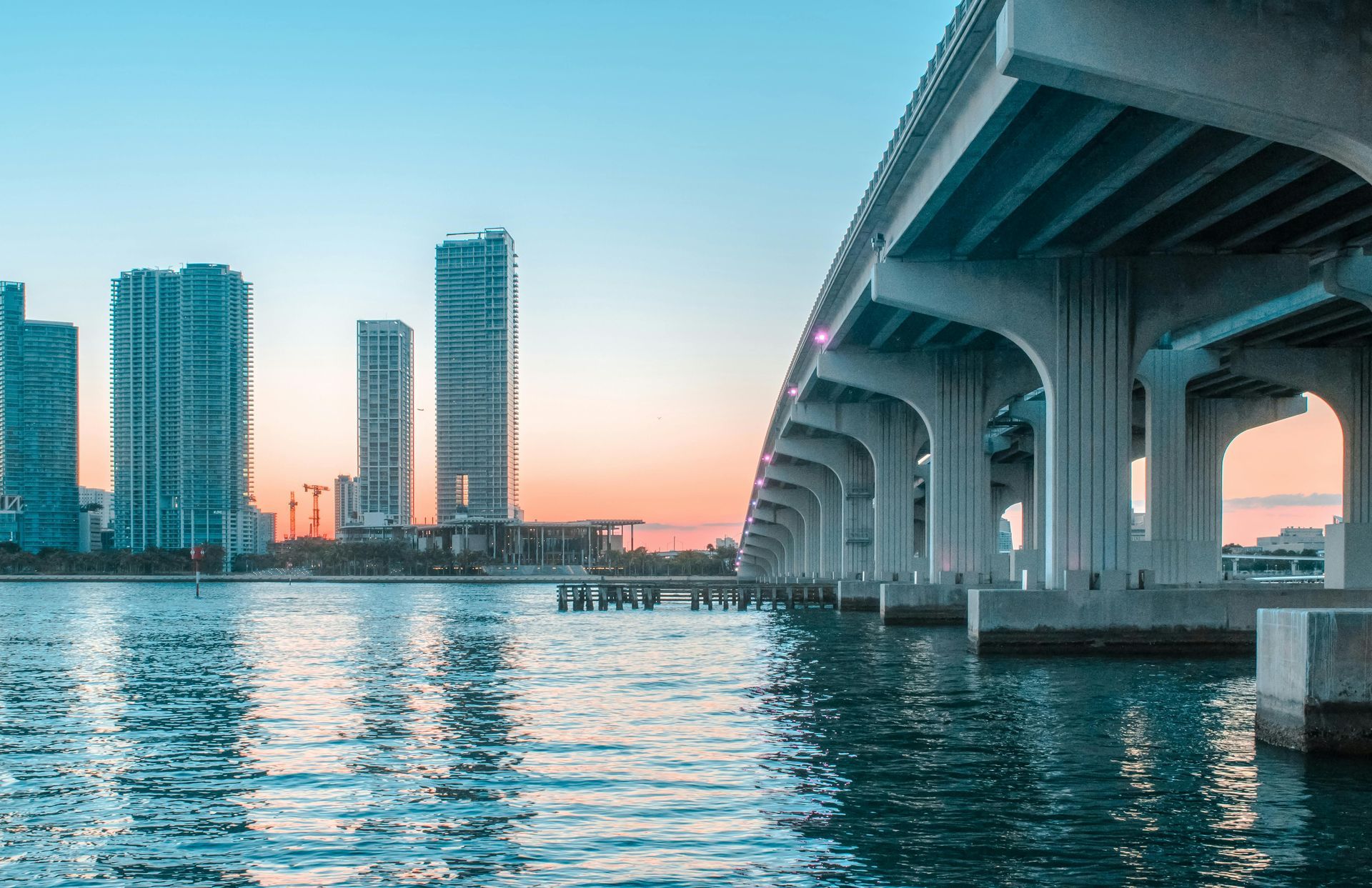 Miami skyline during the day seen from the water near Biscayne Bay with Downtown Miami buildings.