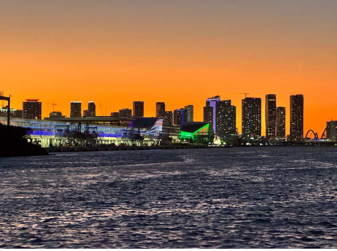 Sunset skyline of Downtown Miami captured from a Biscayne Bay boat cruise during a top-rated Miami tour