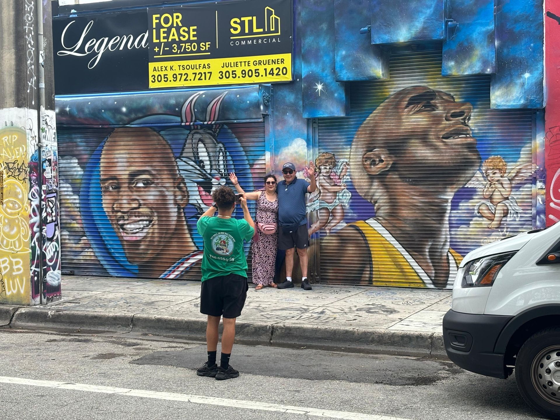 Wynwood tour guide taking photos of passengers during a guided Miami Tour through the art district