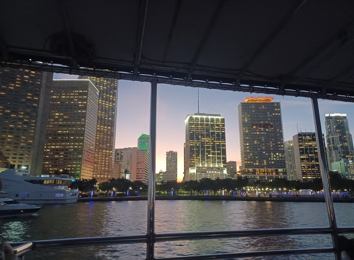 Biscayne Bay sunset cruise view of downtown Miami skyline from sightseeing boat