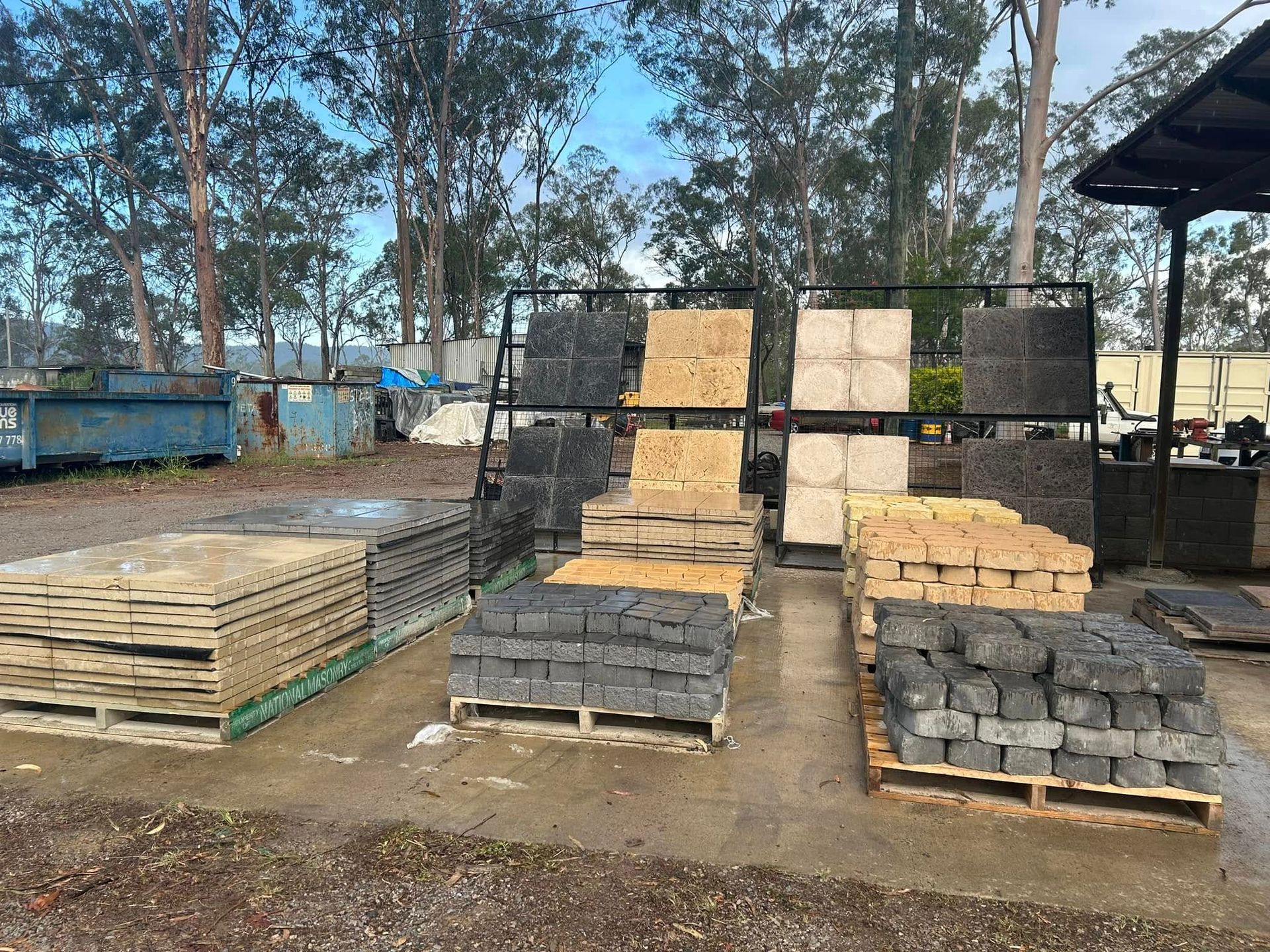 Tan Retaining Wall with Green Foliage — Gladstone Garden & Landscaping Supplies In Burua, QLD