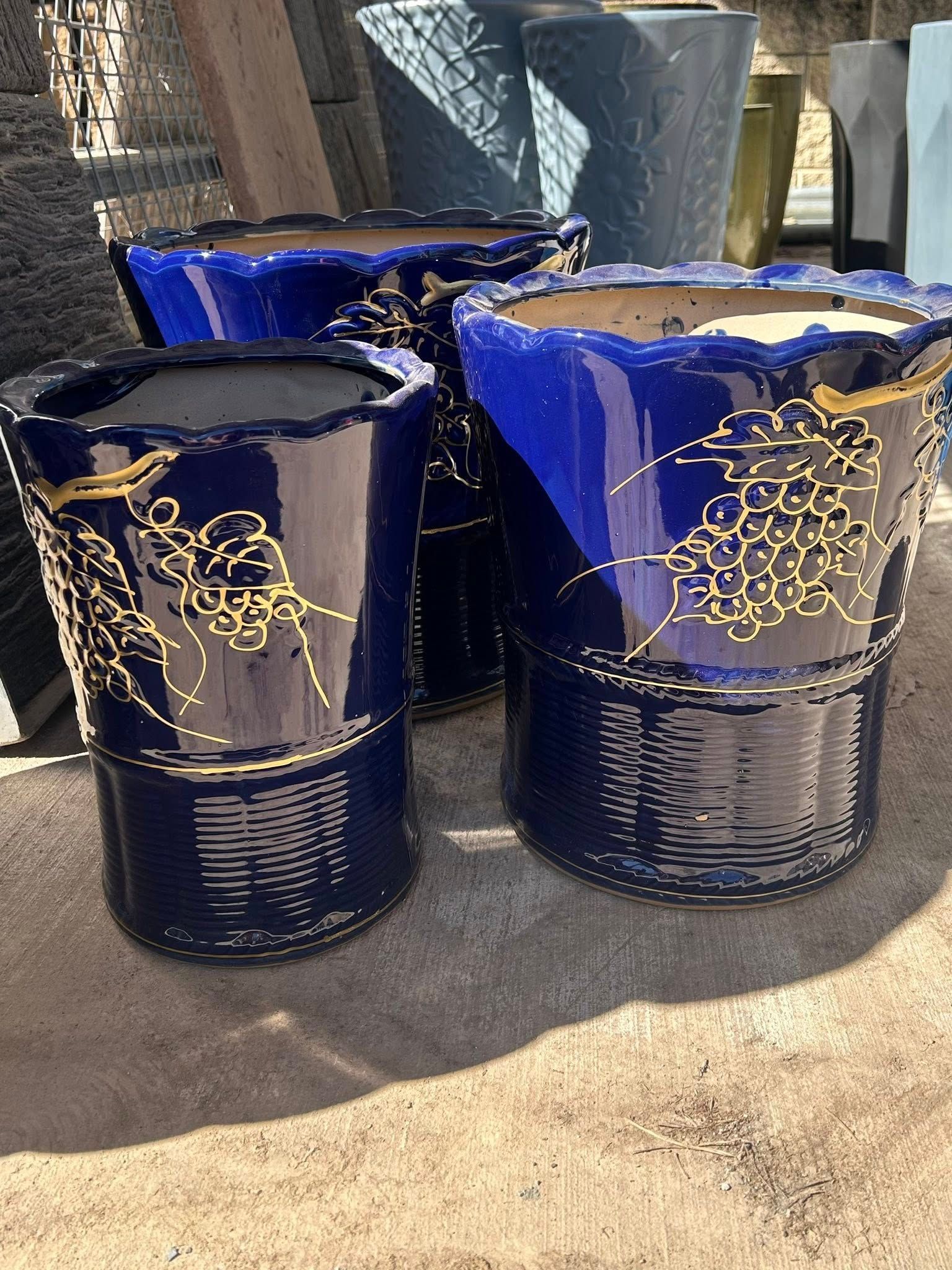 Blue Ceramic Planters with Gold Floral Designs, Outdoors — Gladstone Garden & Landscaping Supplies In Burua, QLD