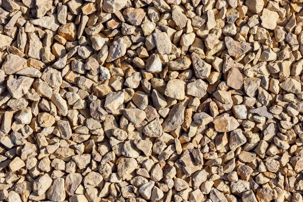 Close-Up View of Beige Gravel, Consisting of Small, Irregular Shaped Rocks — Gladstone Garden & Landscaping Supplies In Burua, QLD