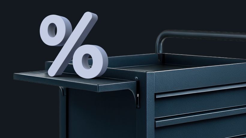 Percentage symbol on a utility cart, dark blue background. | Bad Habit Motorsports LLC