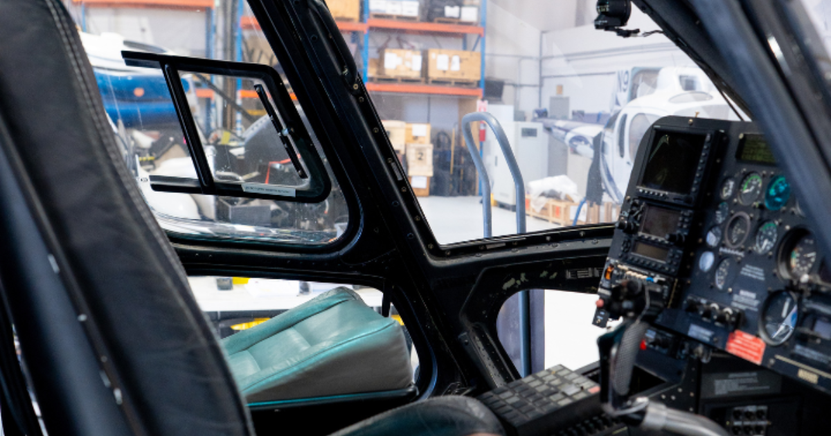 Helicopter cockpit with legacy analog avionics before Garmin upgrade at Black Mountain Aviation in Boulder City Nevada