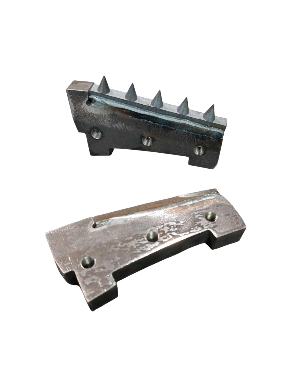 Orange metal wheel with spikes, possibly for heavy machinery or agricultural use.