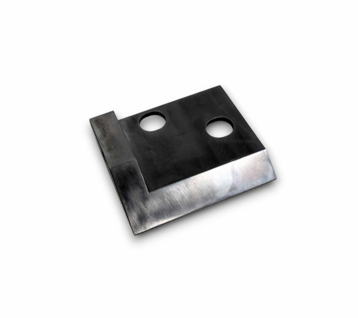 Four black, rectangular, 3D-printed parts; some with holes, others with textured edges, all against white.