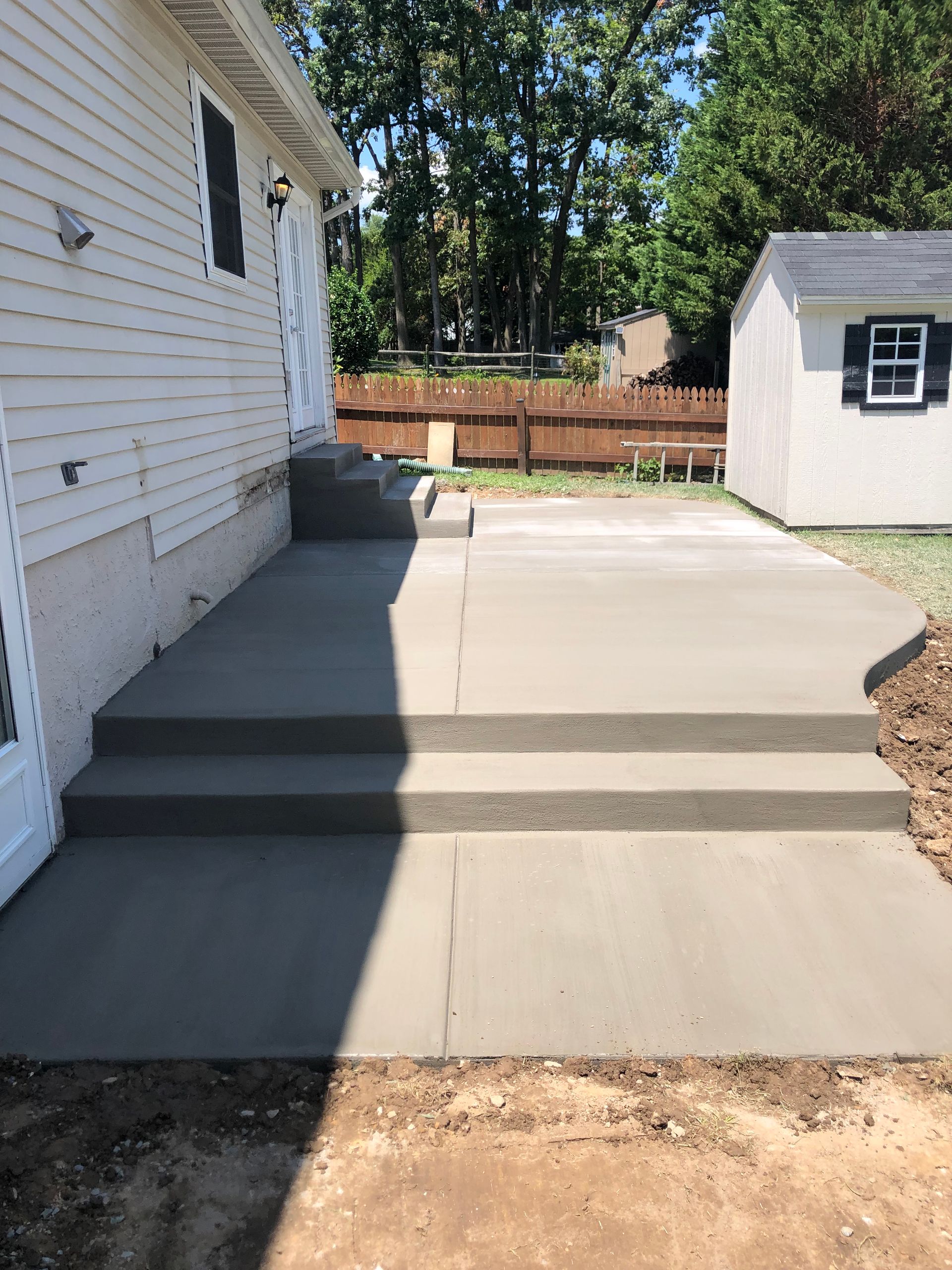 Concrete Patio and steps with a broom finish installed in Nottingham, MD