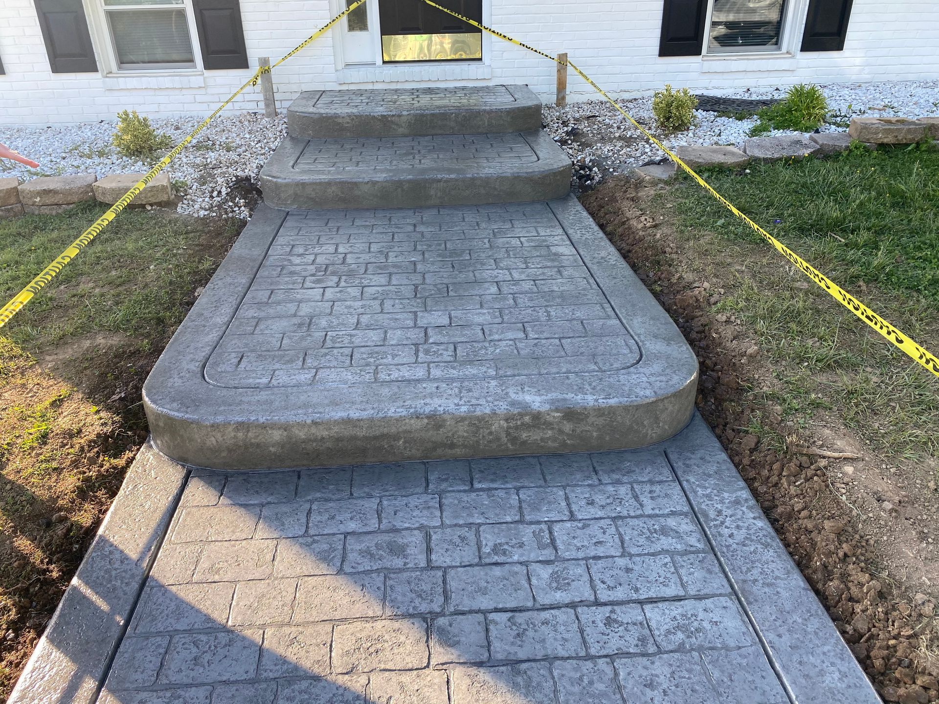 Cobblestone stamped concrete sidewalk installed in Conowingo, MD