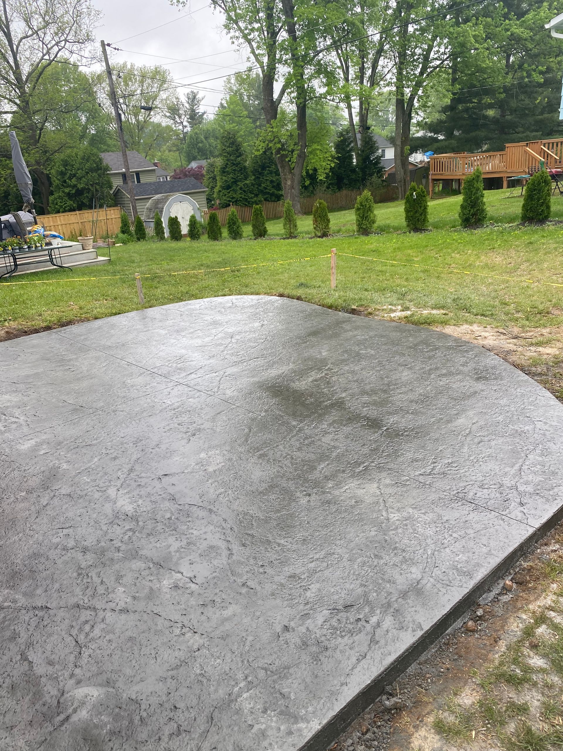 Textured concrete patio in slate grey