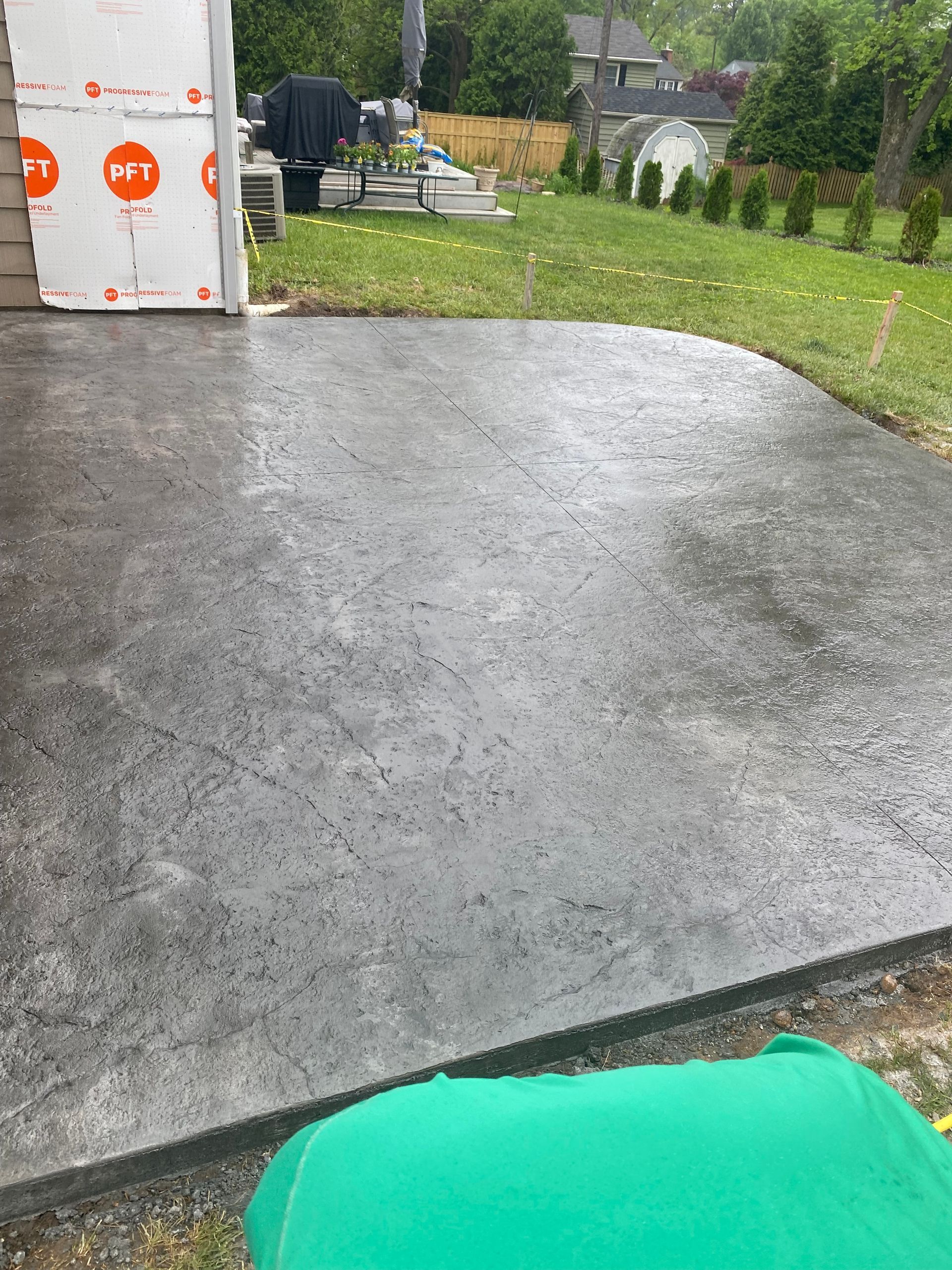 Textured concrete patio in slate grey