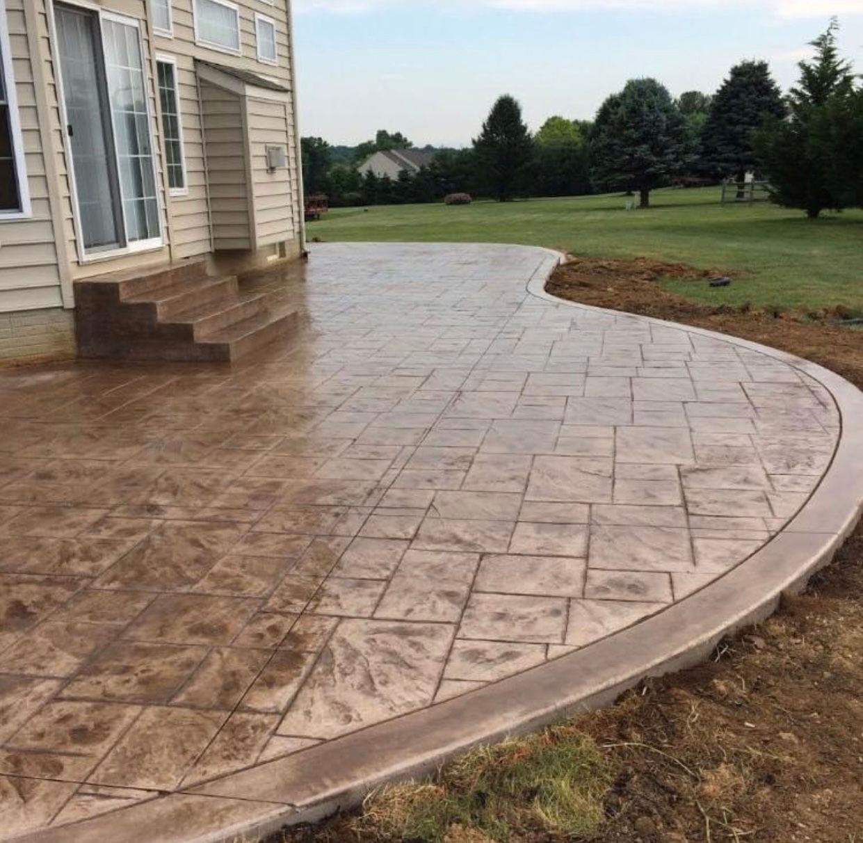 Stamped Concrete patio in ashlar slate installed in Rising Sun, Md
