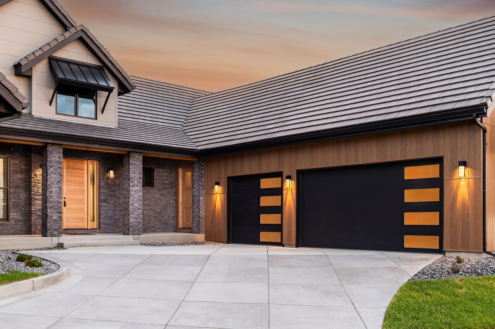 Yellow garage door with a textured surface and windows at the middle.