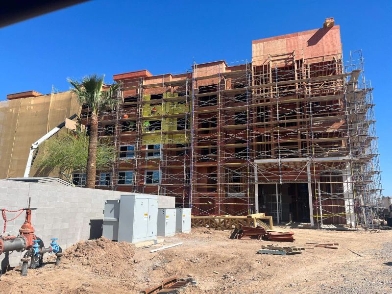 A Large Building Under Construction With Scaffolding Around It
