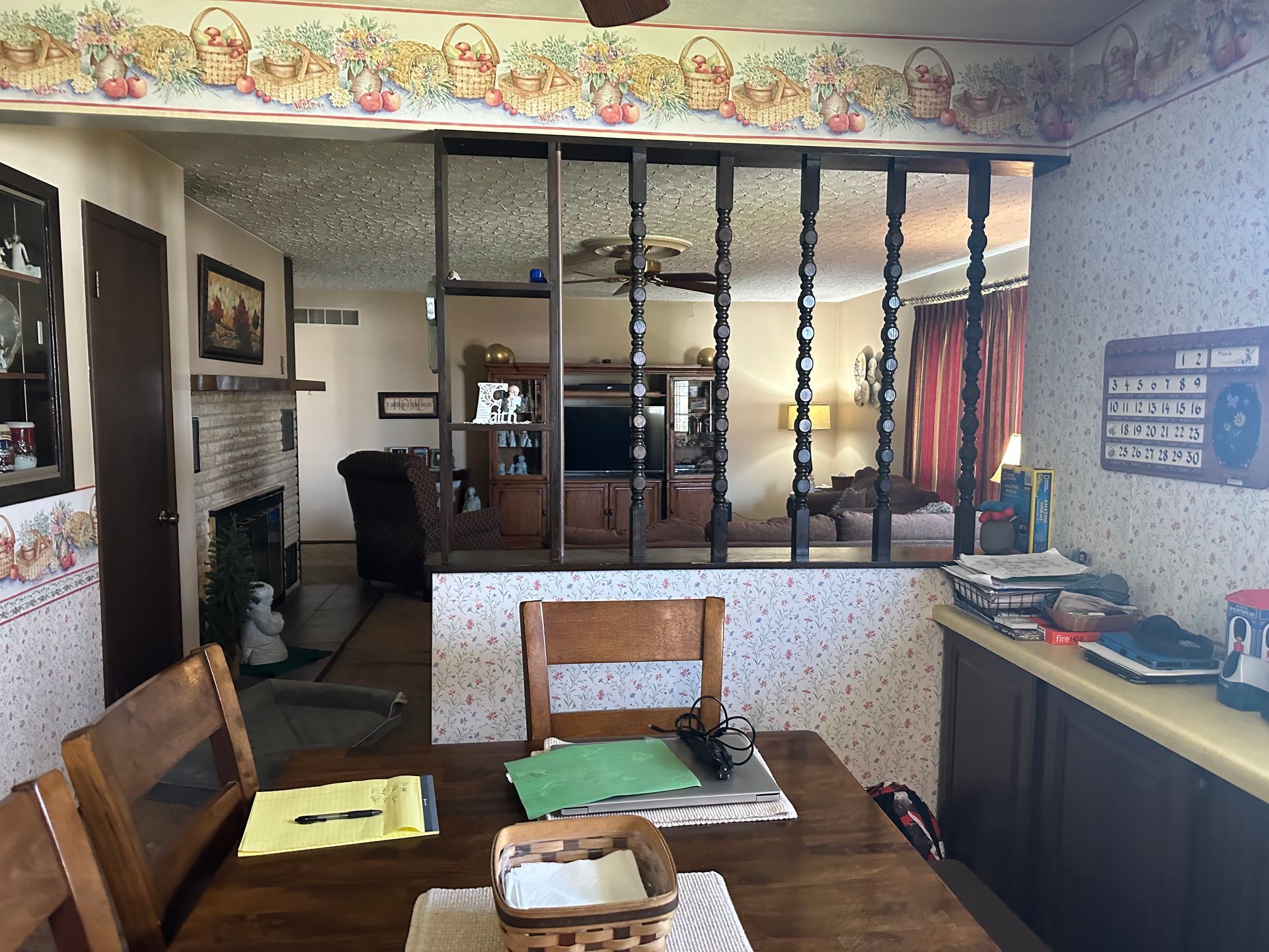 A dining room table and chairs in a house