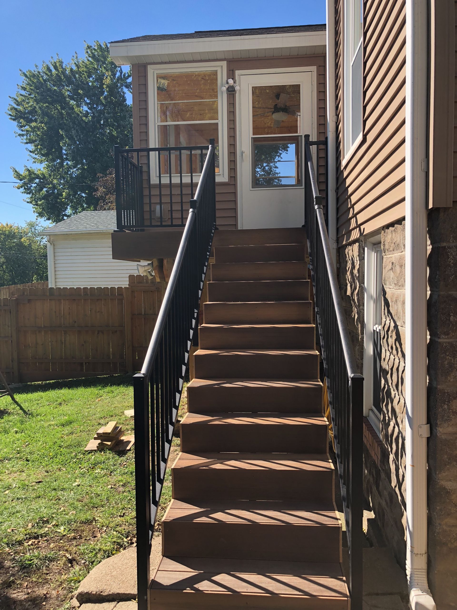 A set of stairs leading up to a house