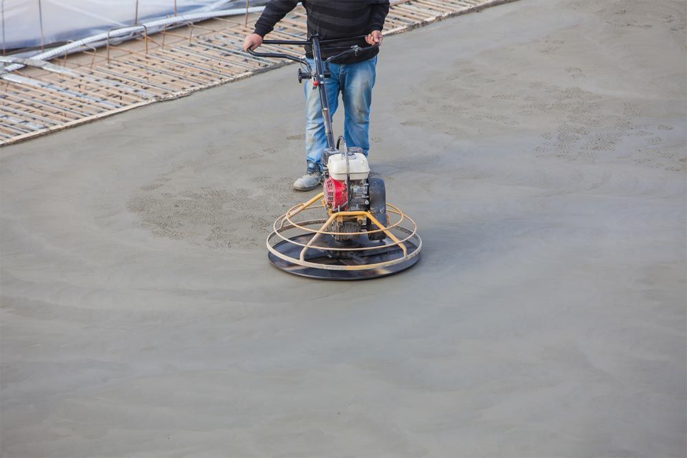 Smoothing A Concrete Slab With A Helicopter