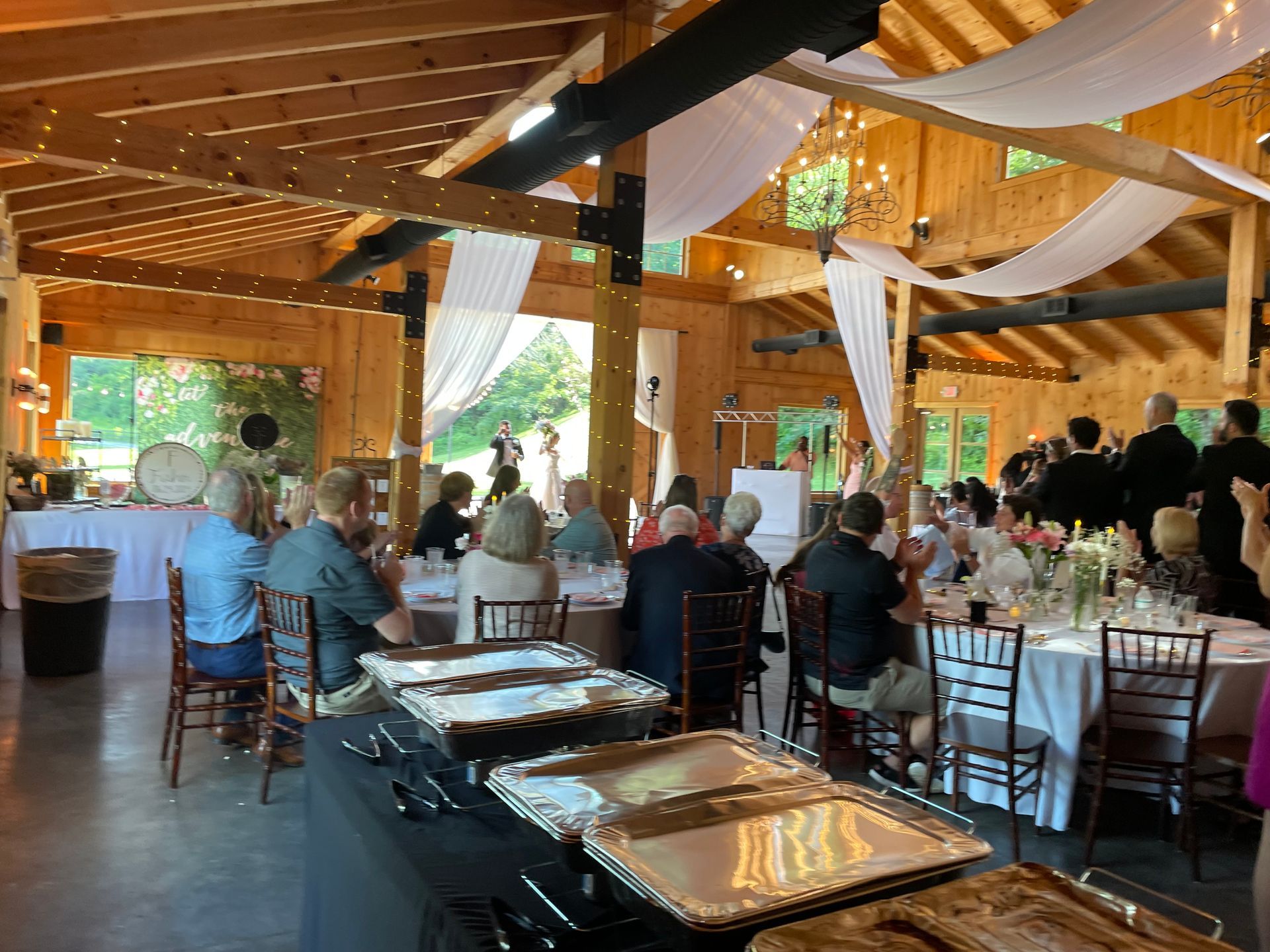 A jar of smokey q sits on a refrigerator shelf