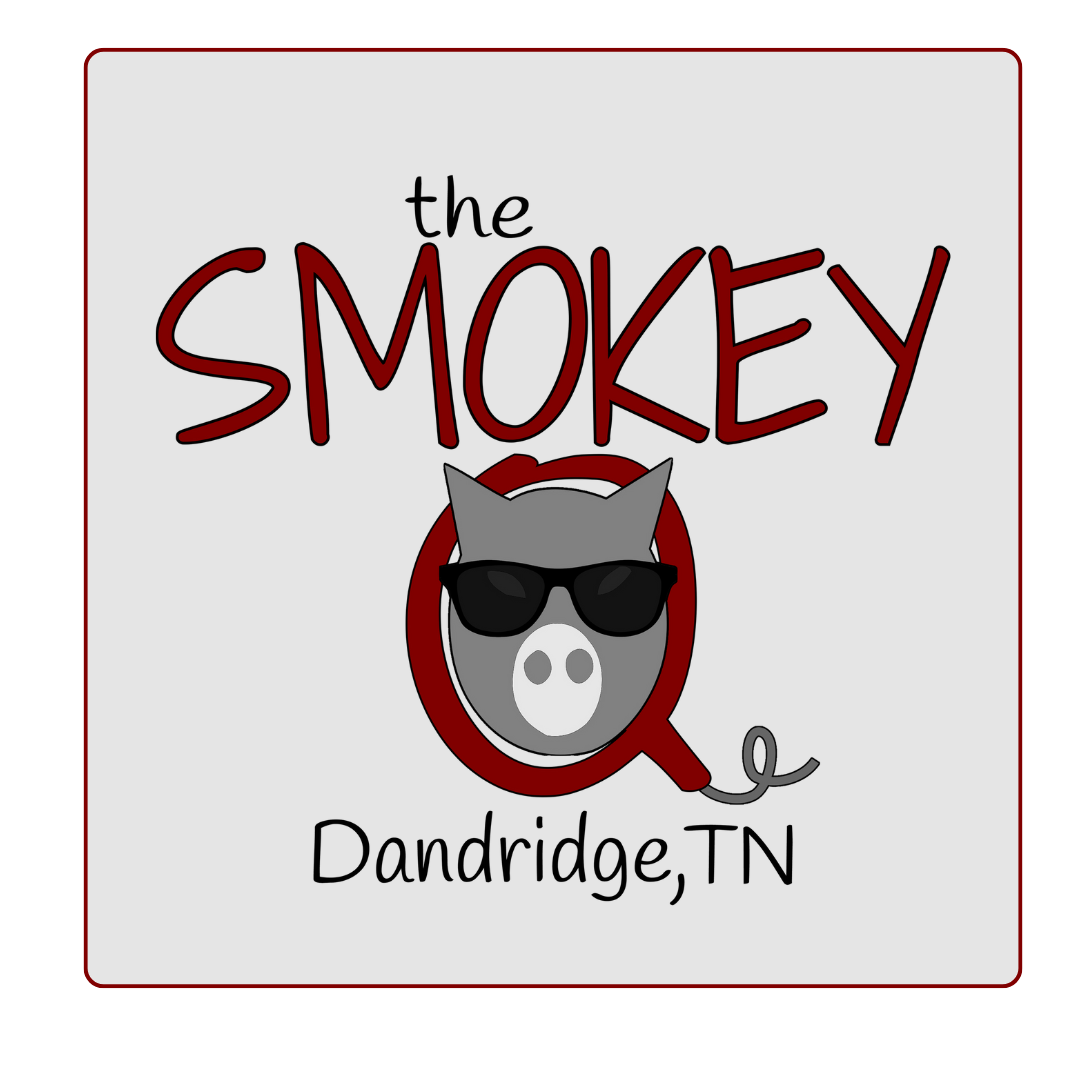 A logo for the smokey dandridge tn with a pig wearing sunglasses.
