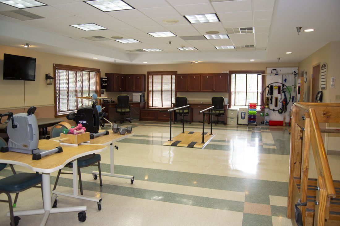 A large room with a lot of tables and chairs