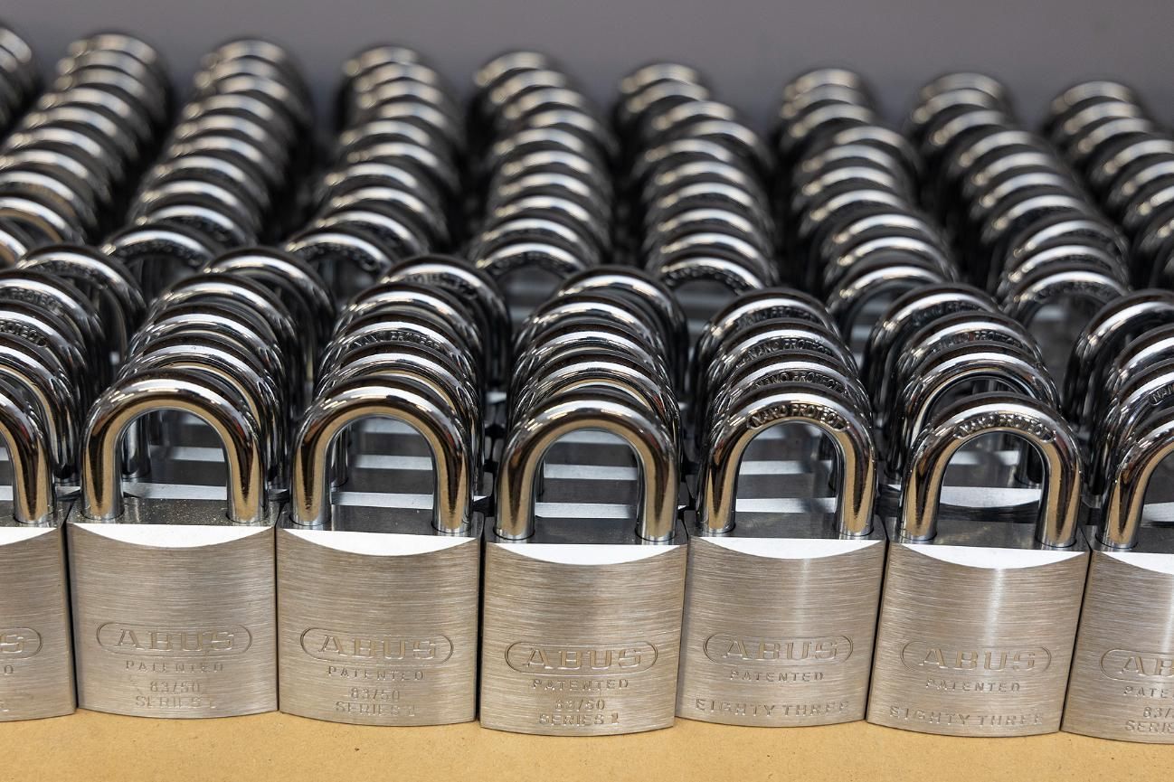 Rows of Silver Padlocks With Arched Handles, Neatly Arranged — Active 24/7 Locksmith and Security Services in Forster, NSW