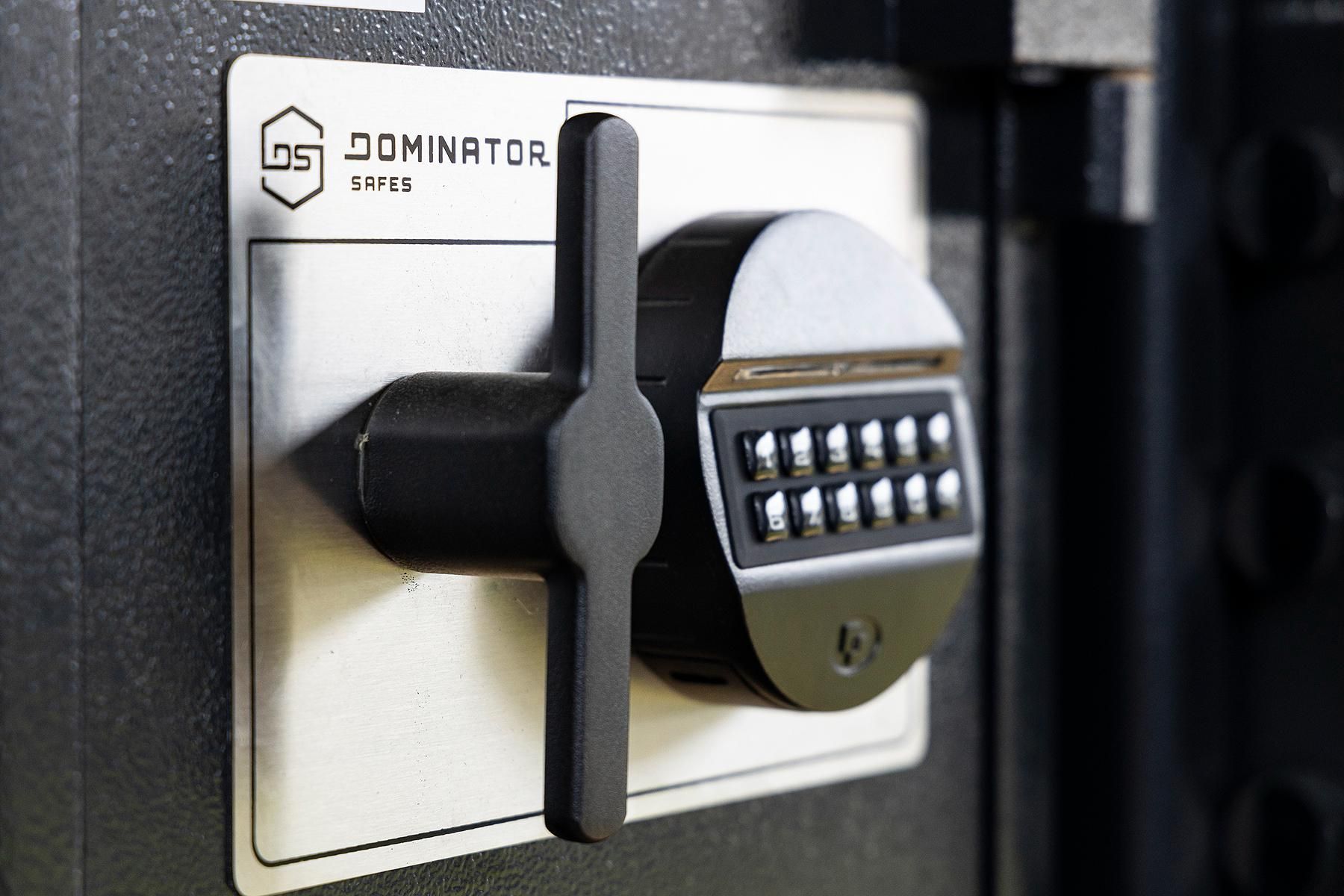 Close-up of a Black Safe Lock With a Keypad and Lever, on a Steel Plate — Active 24/7 Locksmith and Security Services in Forster, NSW