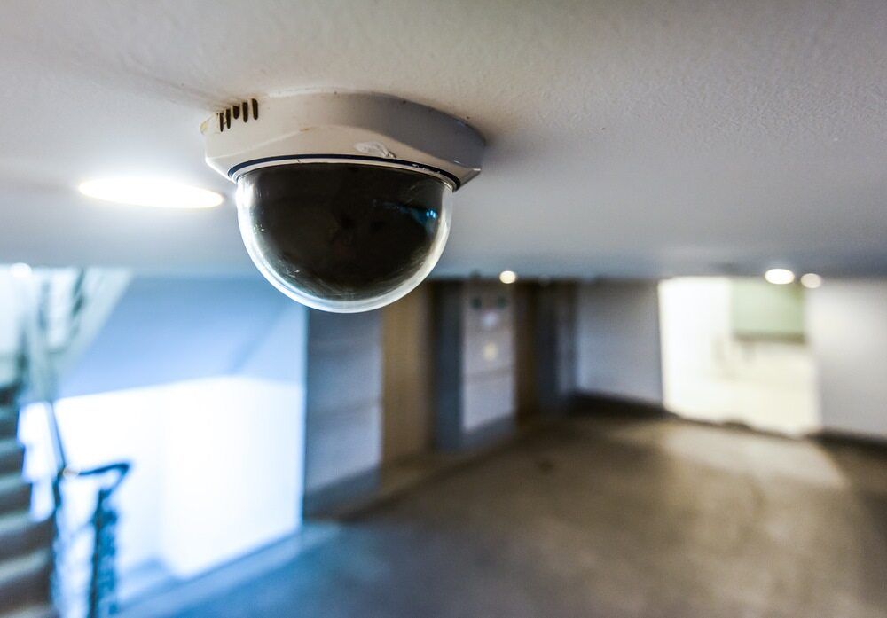 A Security Camera Is Mounted on The Ceiling of A Building — Active 24/7 Locksmiths Forster In Nabiac, NSW
