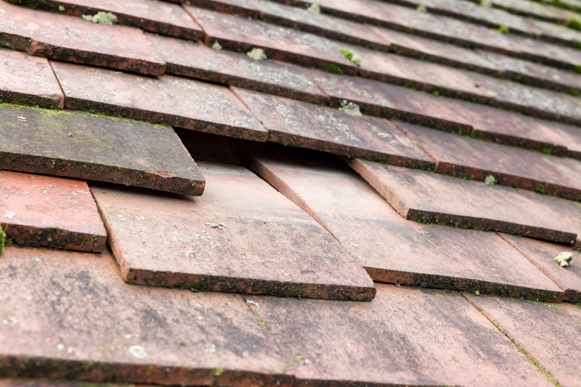 A close up of a roof with a hole in it.