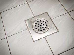 Sewage Cleanup — Drain in home bathroom