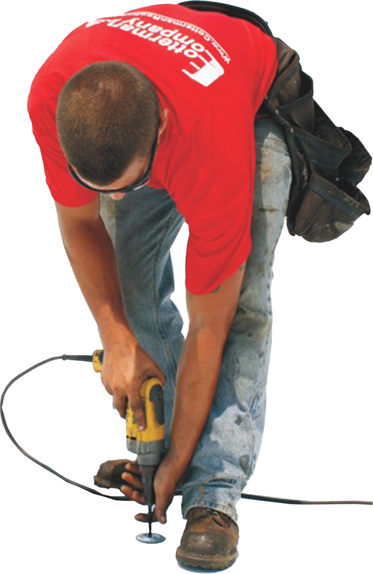 Construction worker using a drill. He's wearing a red shirt, blue jeans, and safety glasses.