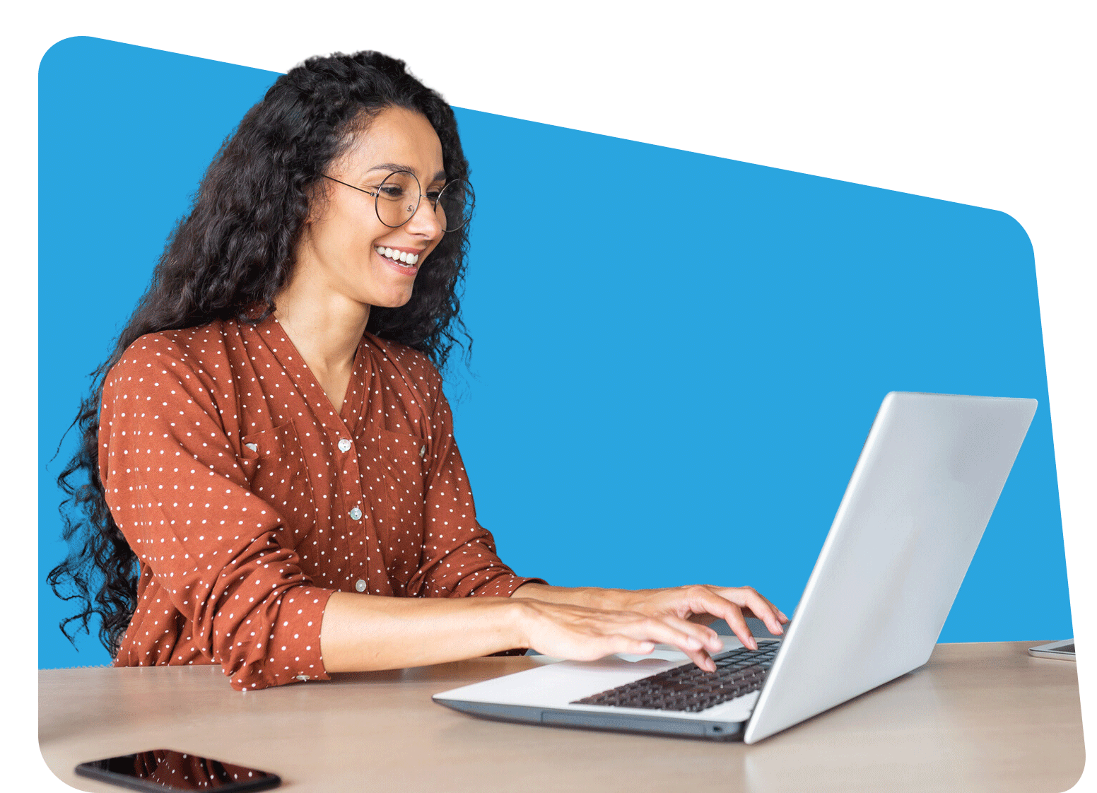 A woman sitting at a desk typing on a laptop — Jacksonville, FL — VipVap