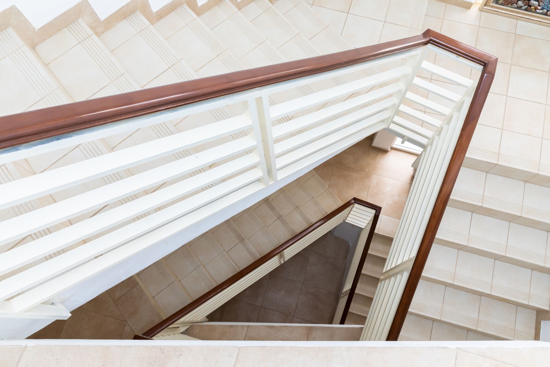 Modern interior featuring stylish stairways with clean lines and elegant design. Modern interior featuring stylish stairways with clean lines and elegant design.