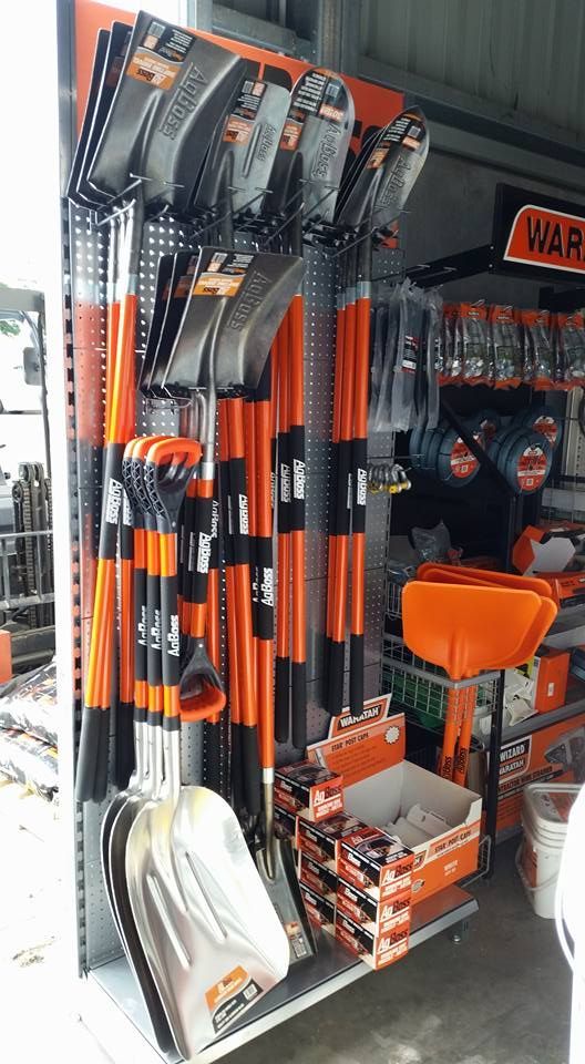 A Display of Shovels and Rakes in a Store — MacCallum & Company In Scone, NSW