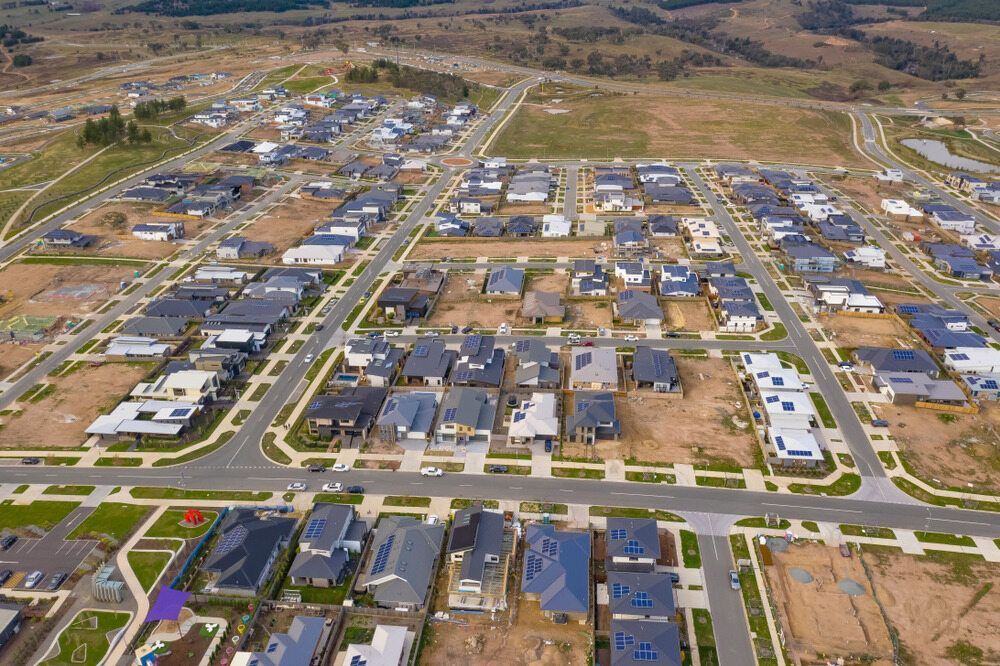 An Aerial View of a Residential Area With Lots of Houses and Streets — MacCallum & Company In Denman, NSW
