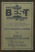 Plaque: San Diego's Best award for auto service & repair. Presented to John's Automotive Care by The San Diego Union-Tribune (2024).