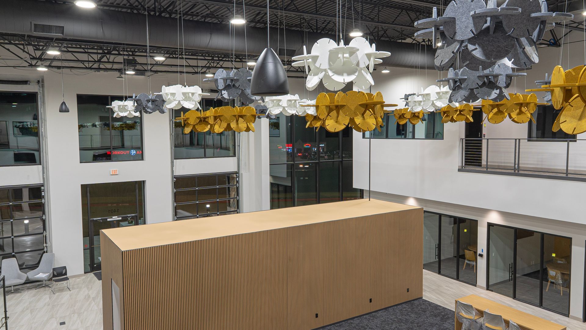 An aerial view of a large building with a table in the middle of it.