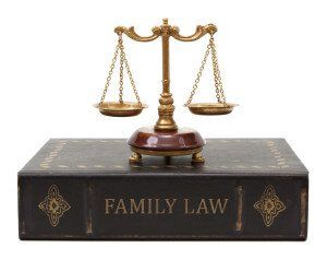 Family Law Book and Scales of Justice