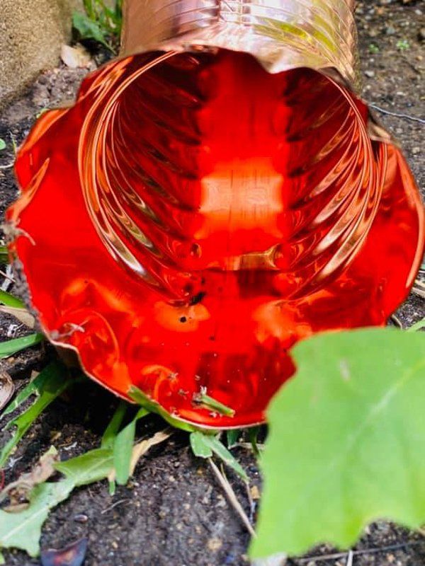 The inside of a rain chain about to be installed in Fort Worth, TX by PT Gutters