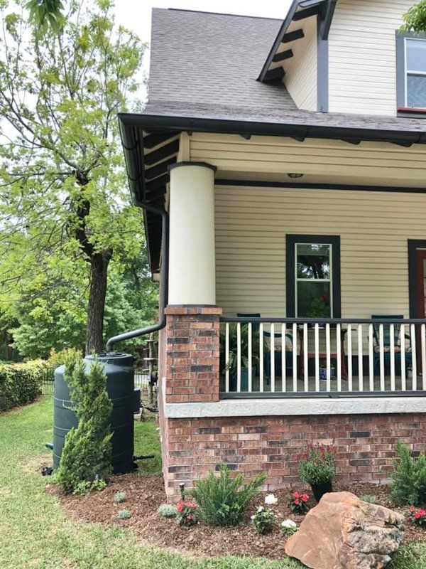 A residential gutter rain collector in Fort Worth, TX by PT Gutters