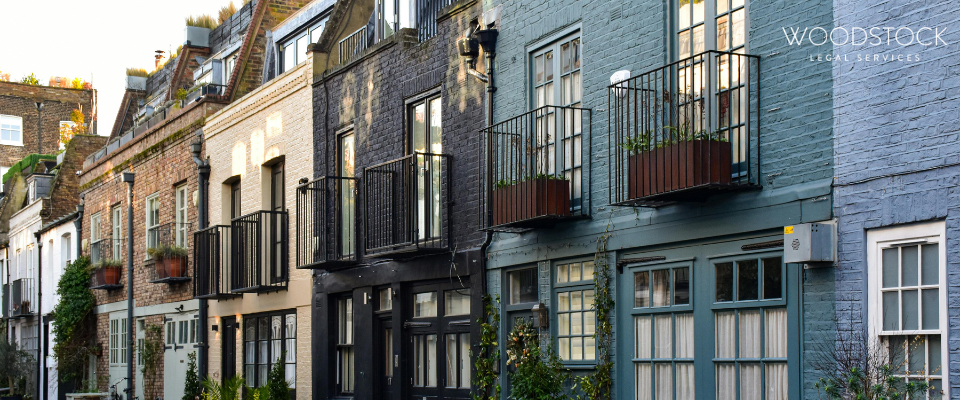 colourful terraced houses with balconies and large windows, featuring  Woodstock Legal Services