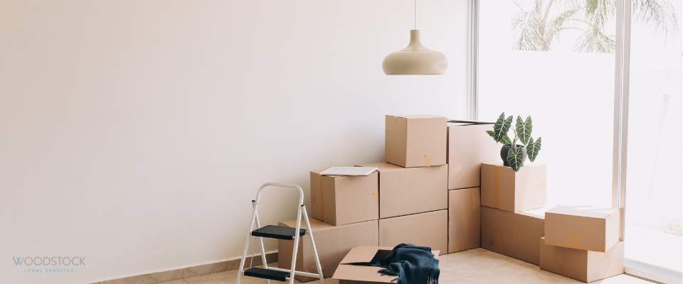 Moving boxes stacked in a rental property, changes landlords may face under the Renters Rights Bill