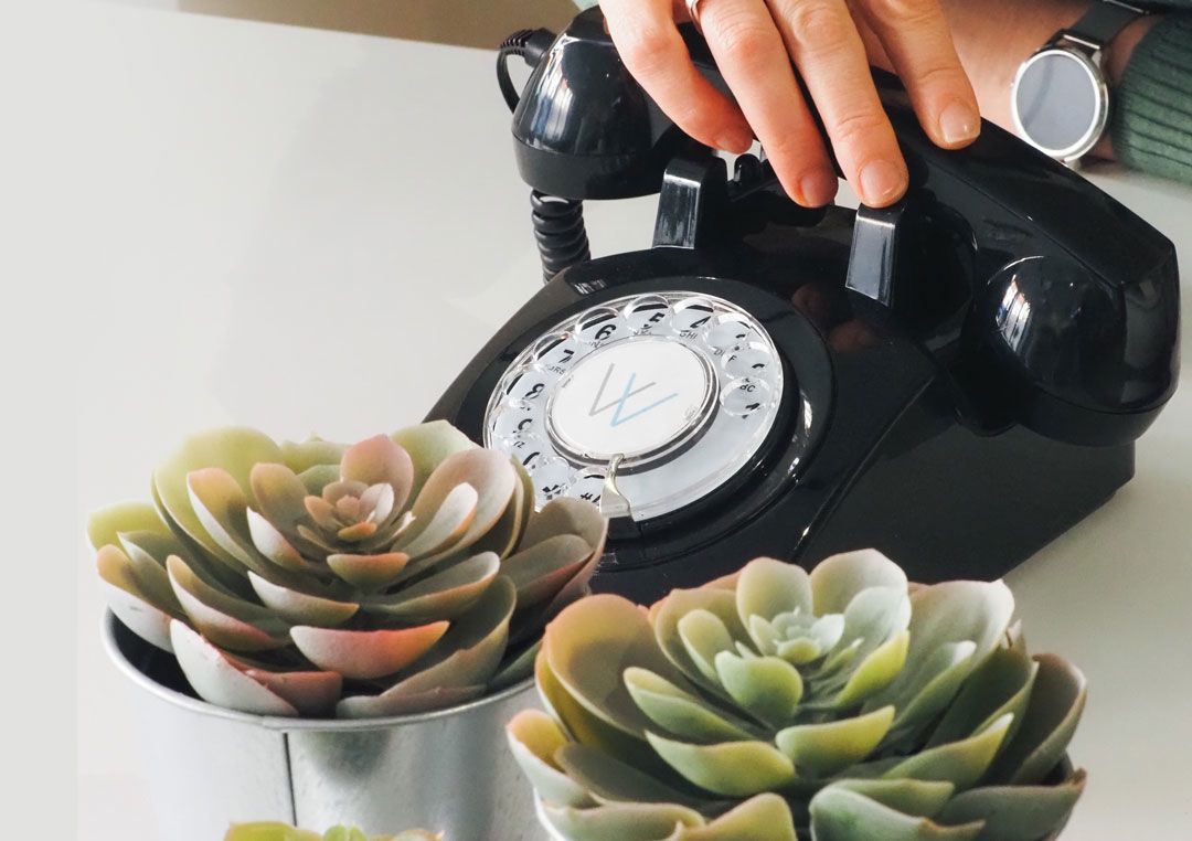 nostalgic image of dial phone with woodstock logo